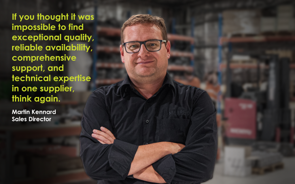 Martin Kennard, Sales Director at MASPRO, standing confidently in a warehouse, with the quote: 